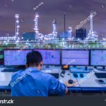 stock-photo-engineering-works-with-the-tablet-in-the-production-control-room-control-room-of-a-steam-turbine-1489100678