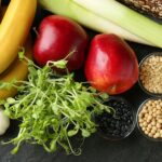 Word,Prebiotic,And,Different,Gut-healthy,Foods,On,Dark,Table,,Top